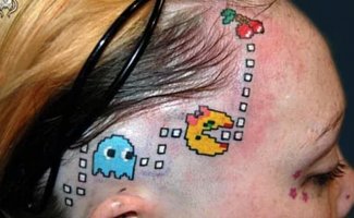 26 ужасных татуировок, которые могли сделать только геймеры (26 фото)